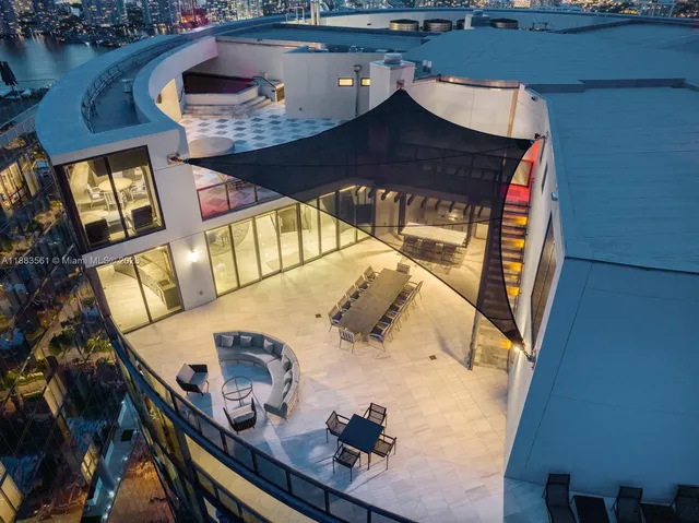 a view of balcony and dining room