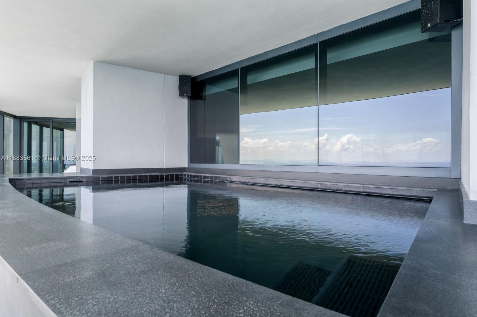 18555 Collins Avenue, Unit PH1 Sunny Isles Beach, FL 33160 - Photo 29 of 32 a view of a floor to room and window