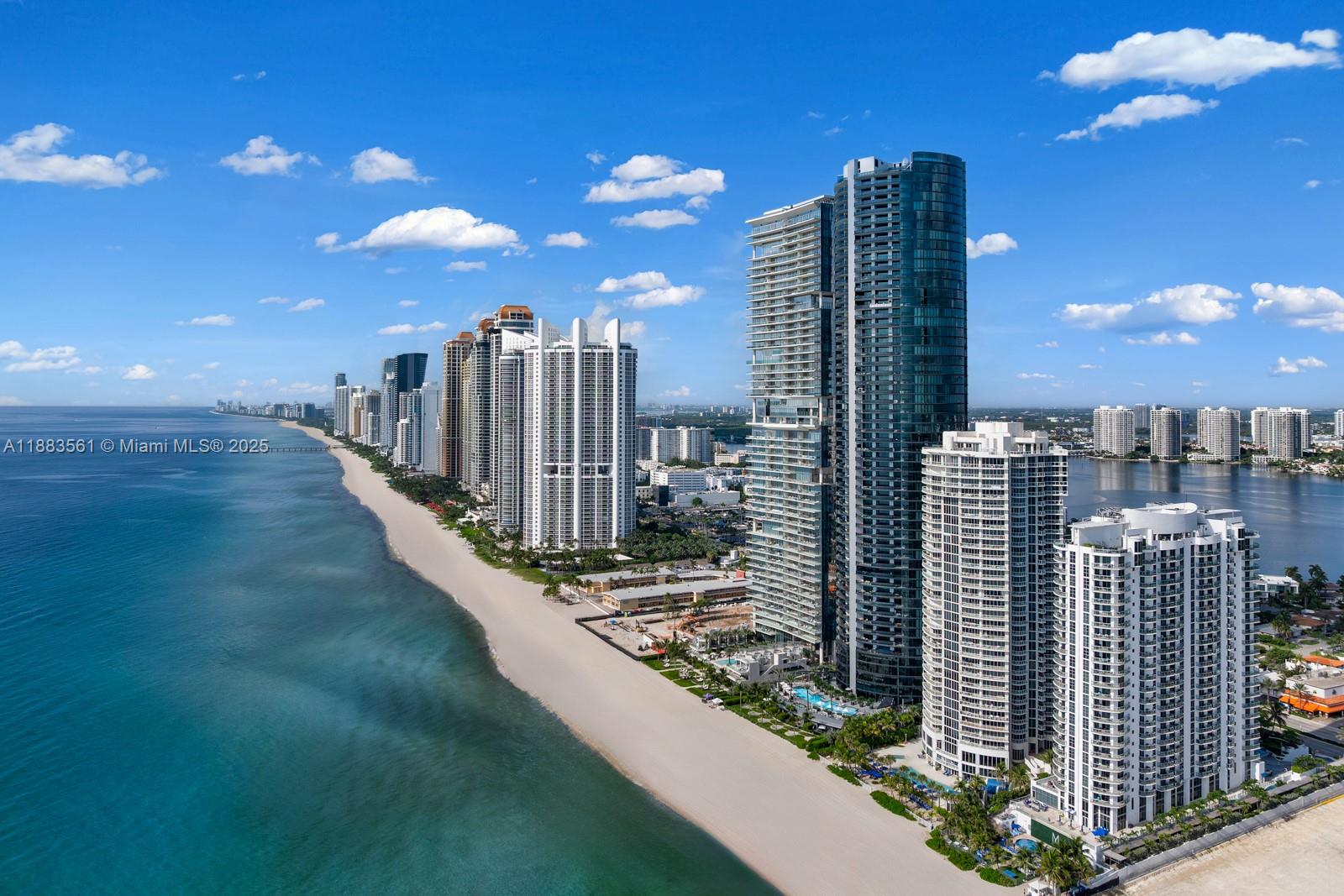 18555 Collins Avenue, Unit PH1 Sunny Isles Beach, FL 33160 - Photo 30 of 32 a view of a balcony with city view