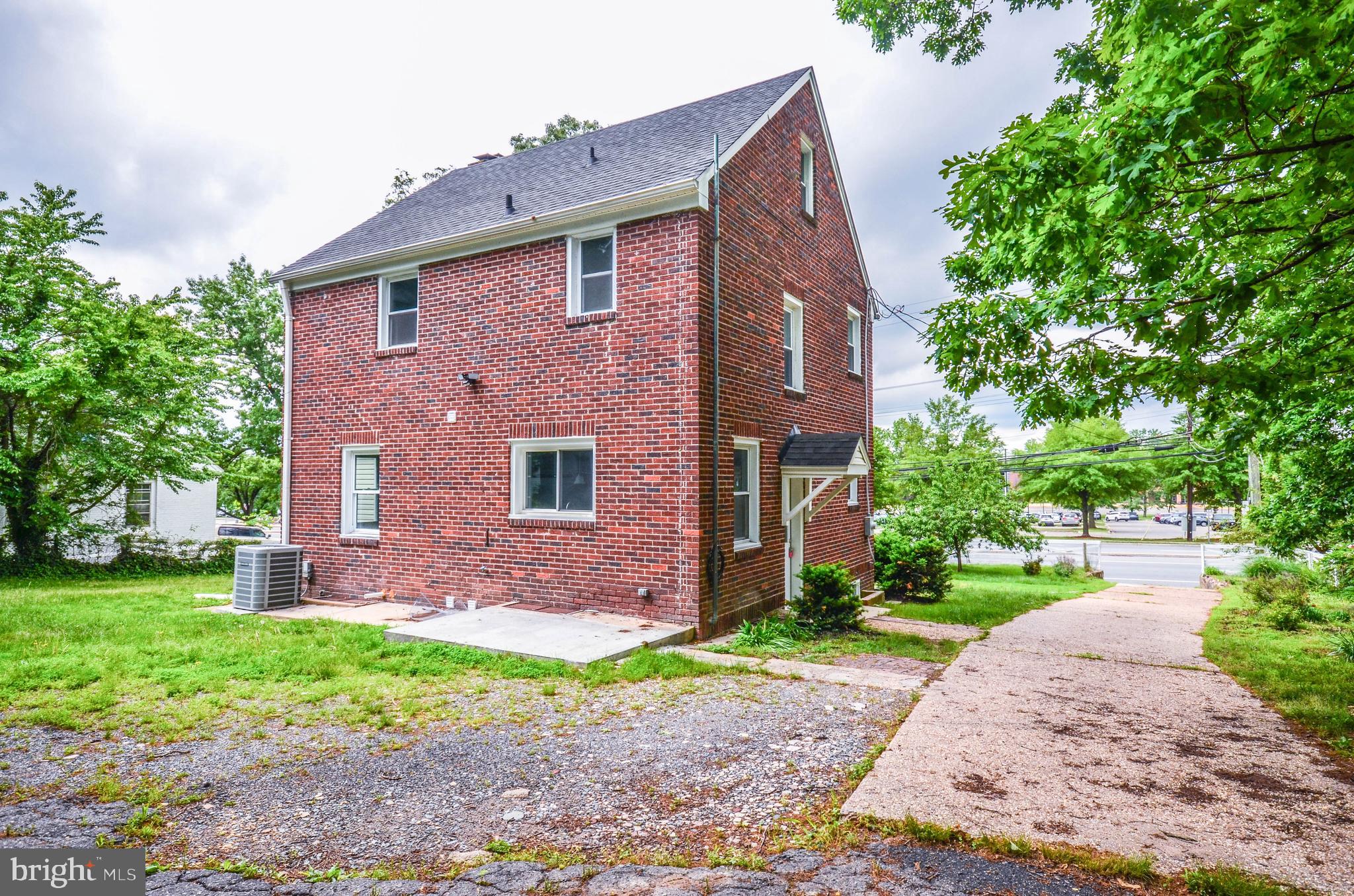 7009 Adelphi Road Hyattsville, MD 20782 - Photo 39 of 41 a front view of a house with garden