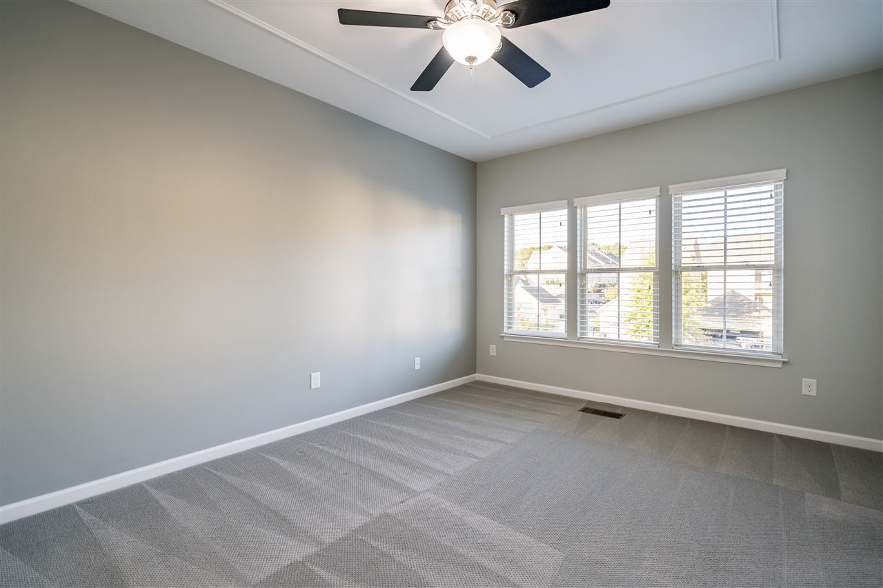 1521 Rodessa Run Raleigh, NC 27607 - Photo 20 of 29 Owner's bedroom features a huge walk in closet, en suite bathroom and tons of natural light. Owner's Bedroom