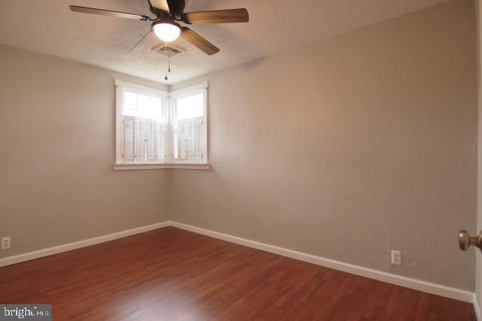 94 Arnold Road Enola, PA 17025 - Photo 15 of 29 Front bedroom , wood flooring, ceiling fan.