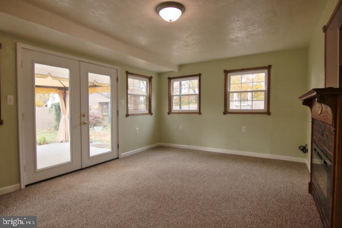 94 Arnold Road Enola, PA 17025 - Photo 23 of 29 All seasons patio room pours in the light!