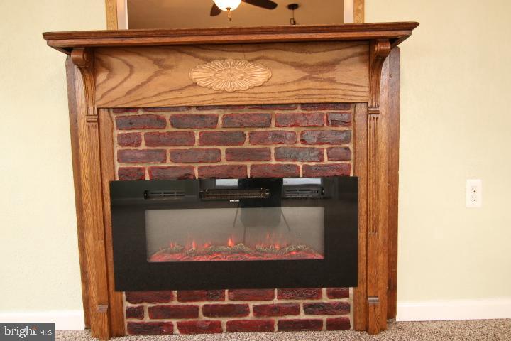 94 Arnold Road Enola, PA 17025 - Photo 24 of 29 Your electric fireplace provides cozy comfort!