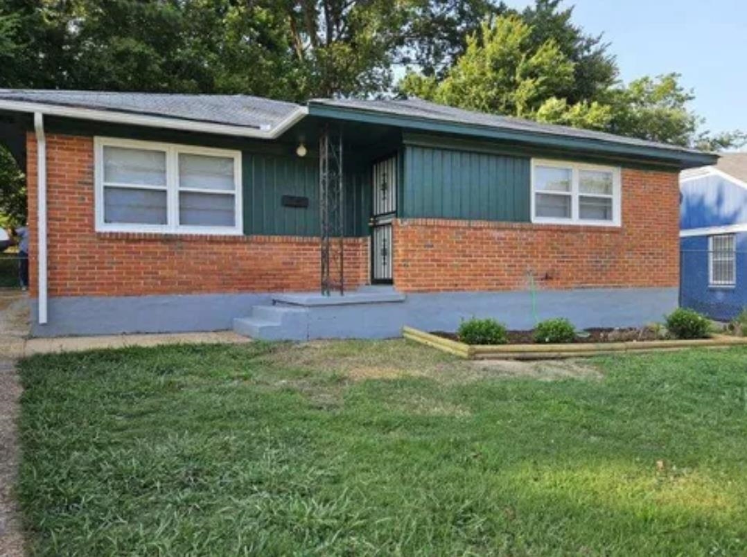 3497 Brantley Road Memphis, TN 38109 - Photo 1 of 10 Ranch-style house with a front yard and brick siding