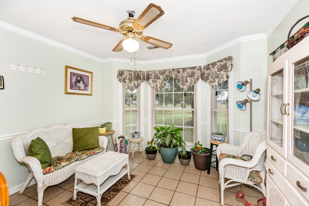 27404 Cedar Hill Road Ardmore, AL 35739 - Photo 13 of 32 a living room with furniture and a large window