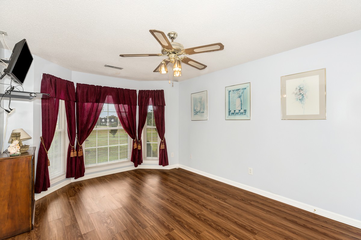 27404 Cedar Hill Road Ardmore, AL 35739 - Photo 20 of 32 a view of room with wooden floor and windows