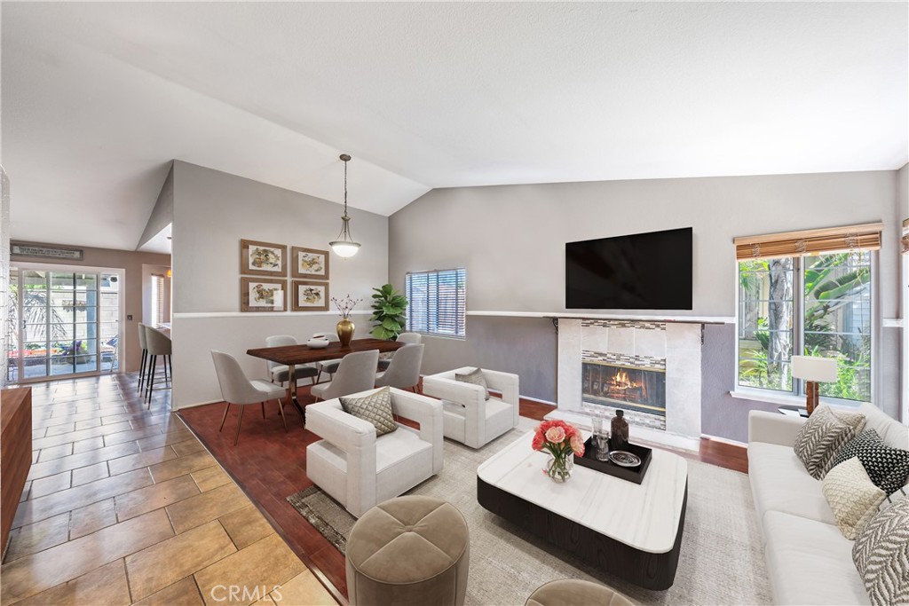 8623 Northstar Drive Riverside, CA 92508 - Photo 1 of 1 a living room with furniture a fireplace and a flat screen tv