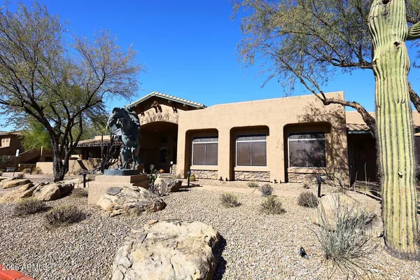 a view of a house with a snow in the yard