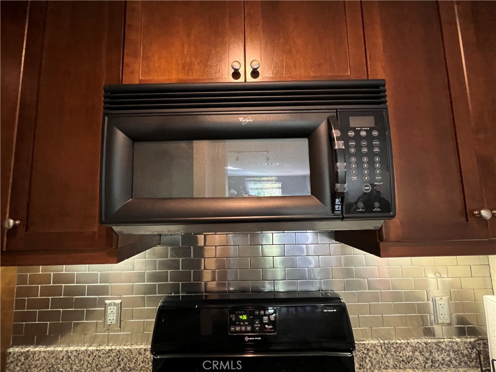 2377 Scholarship Irvine, CA 92612 - Photo 13 of 37 a close view of a fireplace in the kitchen