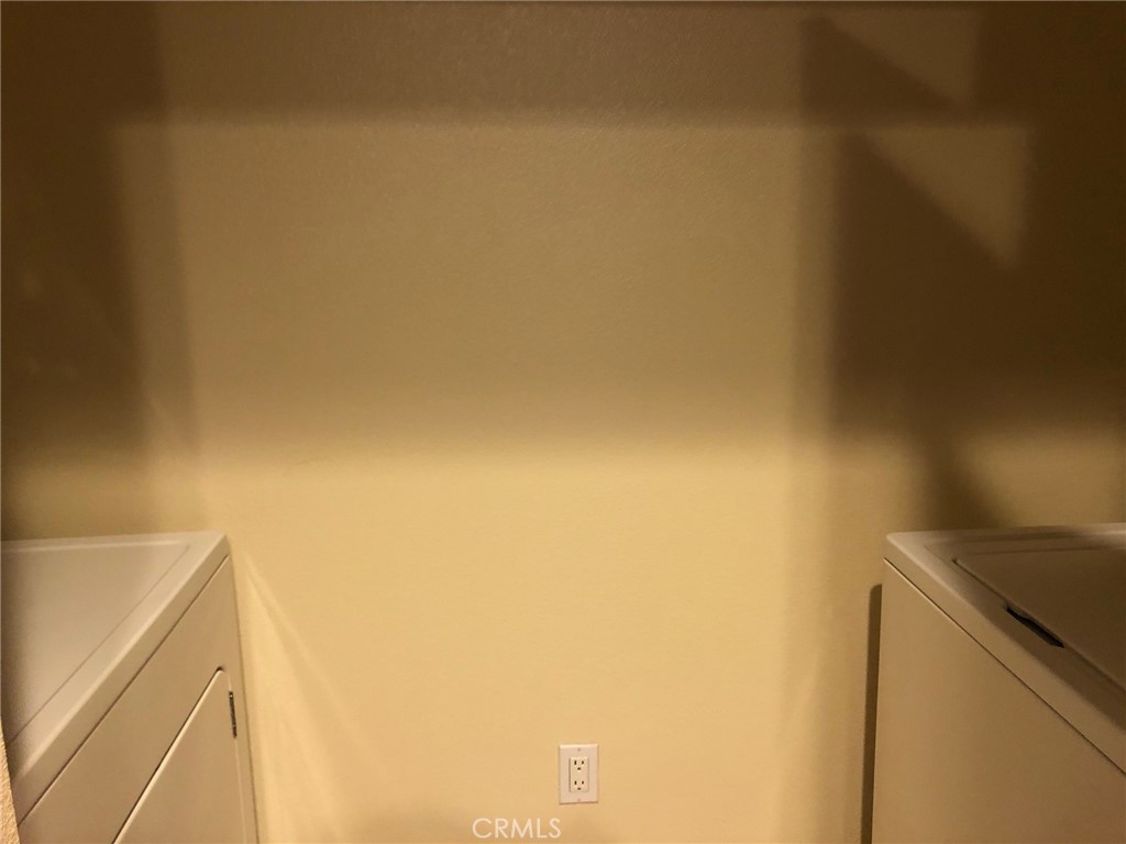 2377 Scholarship Irvine, CA 92612 - Photo 19 of 37 a utility room with dryer and washer