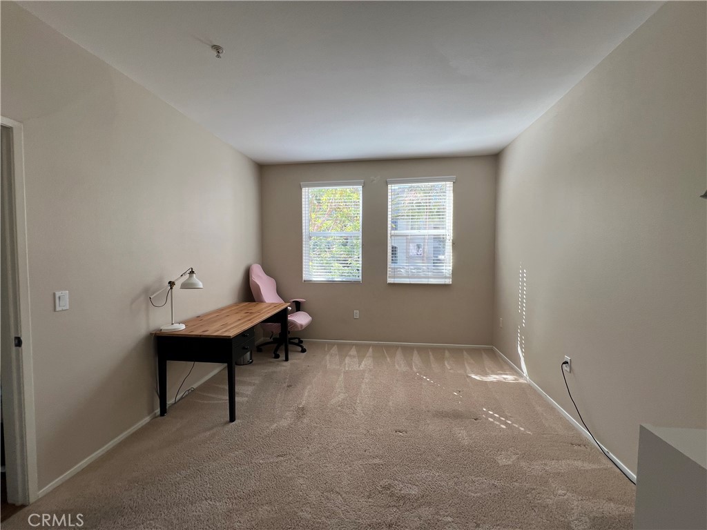 2377 Scholarship Irvine, CA 92612 - Photo 20 of 37 a living room with furniture and a window
