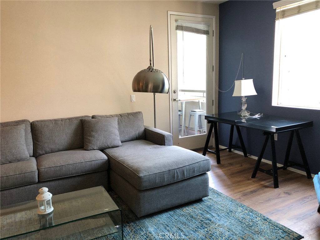 2377 Scholarship Irvine, CA 92612 - Photo 9 of 37 a living room with a couch and a table