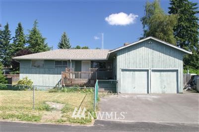 131 234th Place Southwest Bothell, WA 98021 - Photo 1 of 1 a front view of a house with a yard