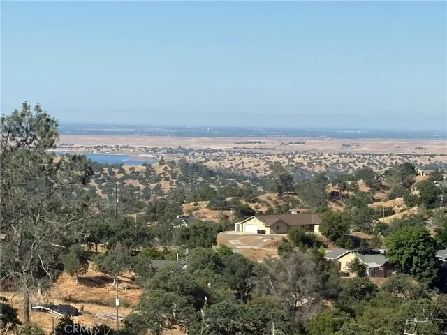 an aerial view of residential building and green space