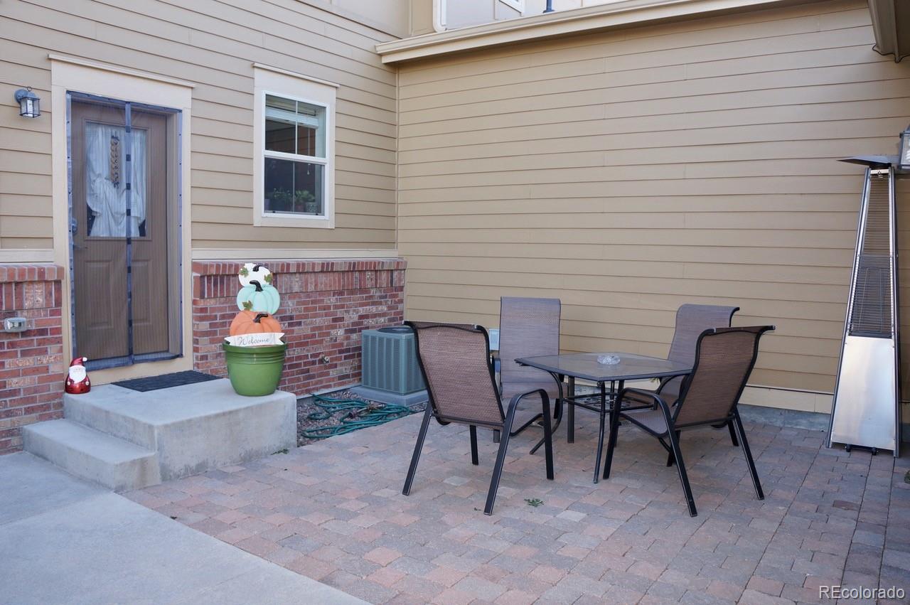 10269 Bellwether Lane Lone Tree, CO 80124 - Photo 16 of 17 a view of a patio with couple of chairs