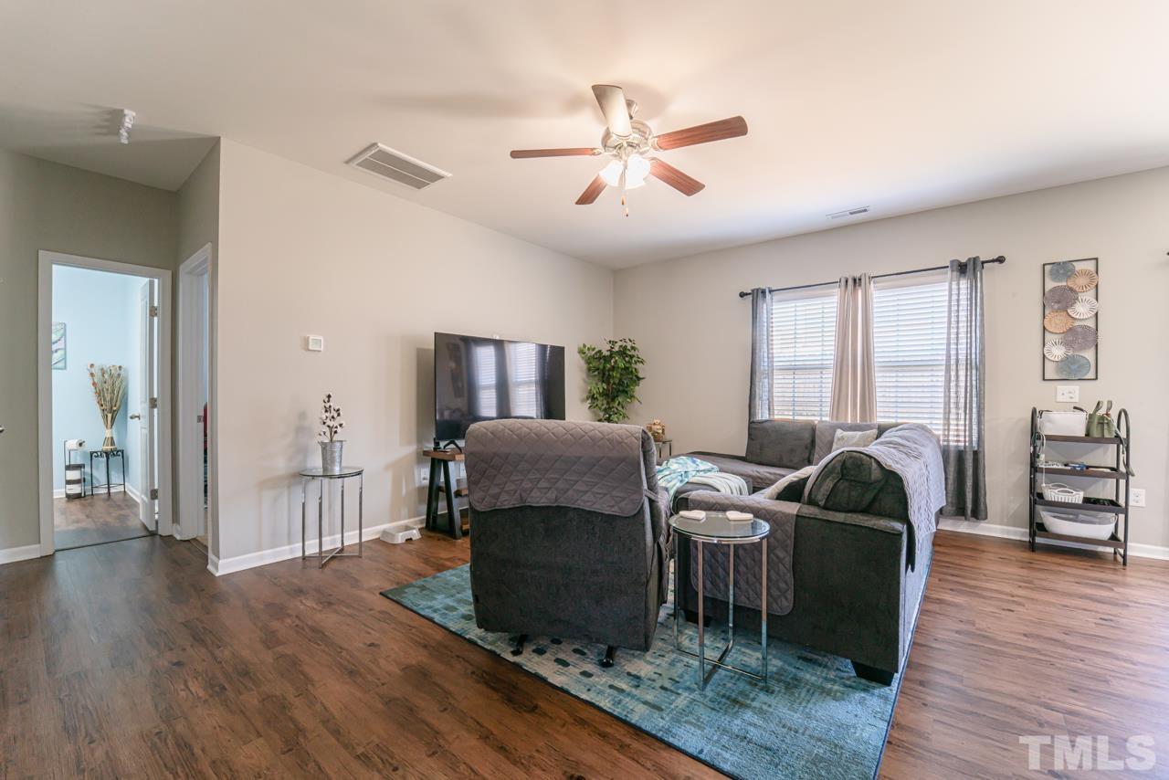 3617 Marble Ridge Lane Raleigh, NC 27610 - Photo 13 of 30 a living room with furniture and a window