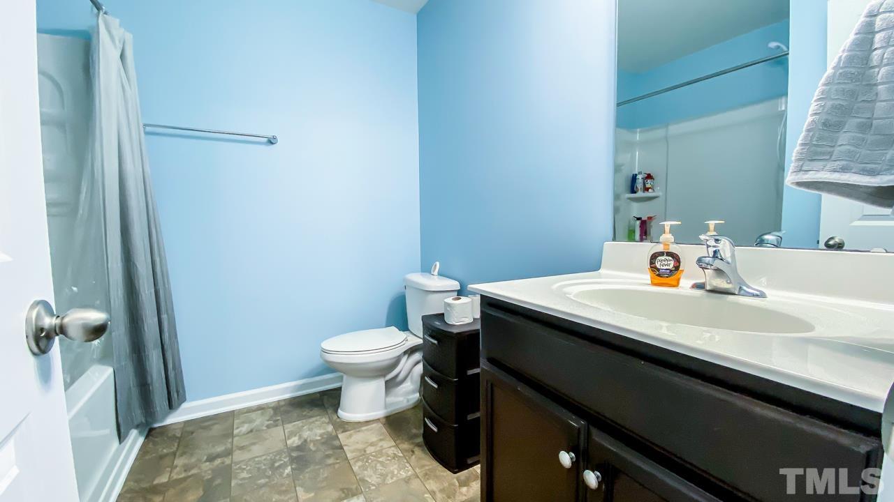 3617 Marble Ridge Lane Raleigh, NC 27610 - Photo 28 of 30 a bathroom with a sink and toilet