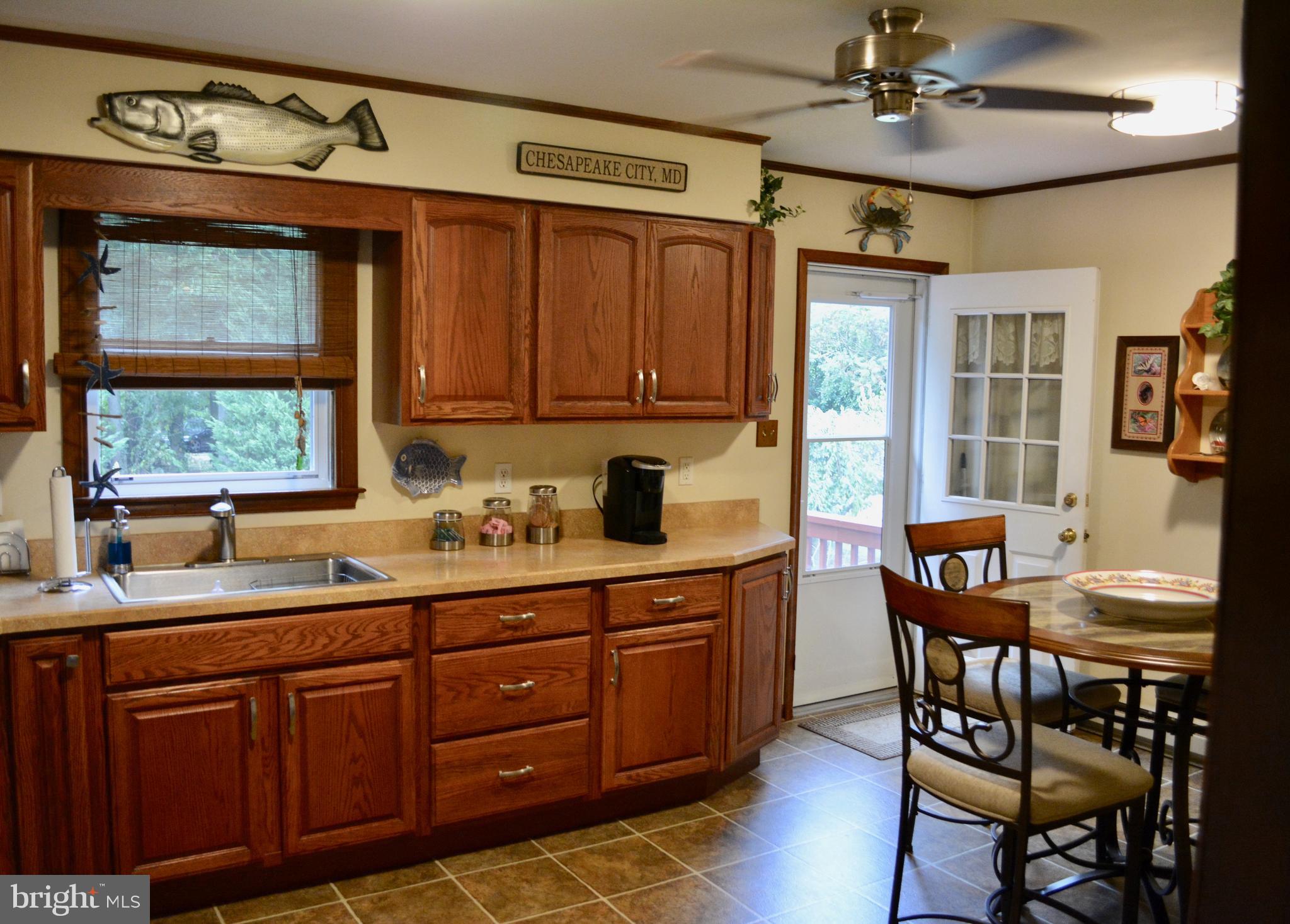 53 N Road Chesapeake City, MD 21915 - Photo 5 of 25 Kitchen - Opens out onto the deck