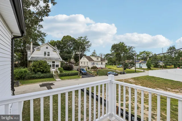 an aerial view of a house with yard swimming pool and outdoor seating