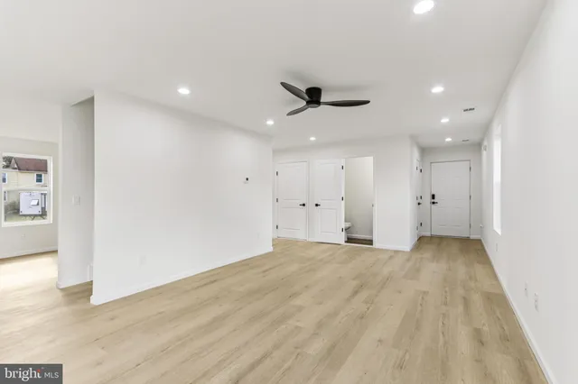 a view of an empty room and window