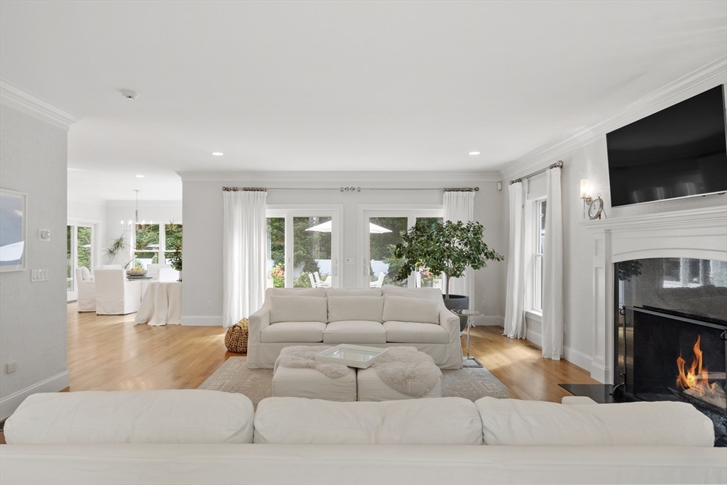 77 Revolutionary Road Concord, MA 01742 - Photo 13 of 42 a living room with furniture fireplace and flat screen tv