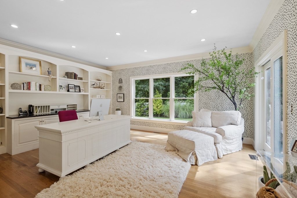 77 Revolutionary Road Concord, MA 01742 - Photo 15 of 42 a living room with furniture and a large window