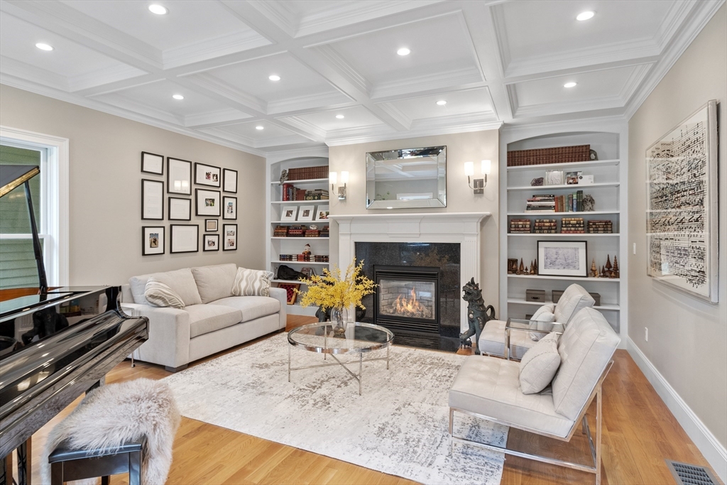 77 Revolutionary Road Concord, MA 01742 - Photo 3 of 42 a living room with furniture and a fireplace