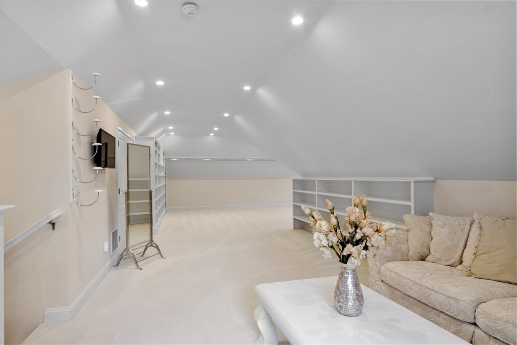 77 Revolutionary Road Concord, MA 01742 - Photo 31 of 42 a living room with furniture