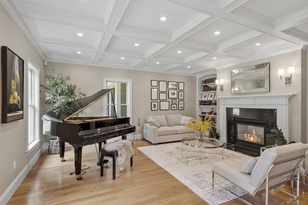 77 Revolutionary Road Concord, MA 01742 - Photo 4 of 42 a living room with furniture and a fireplace