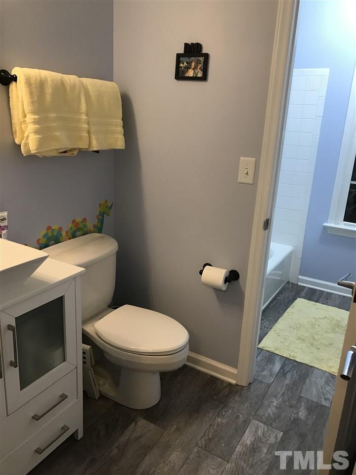 2136 Bellaire Avenue Raleigh, NC 27608 - Photo 5 of 6 a bathroom with a toilet and a sink