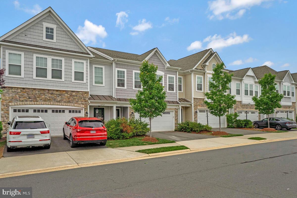 42523 Benfold Square Brambleton, VA 20148 - Photo 3 of 29 a car parked in front of a building