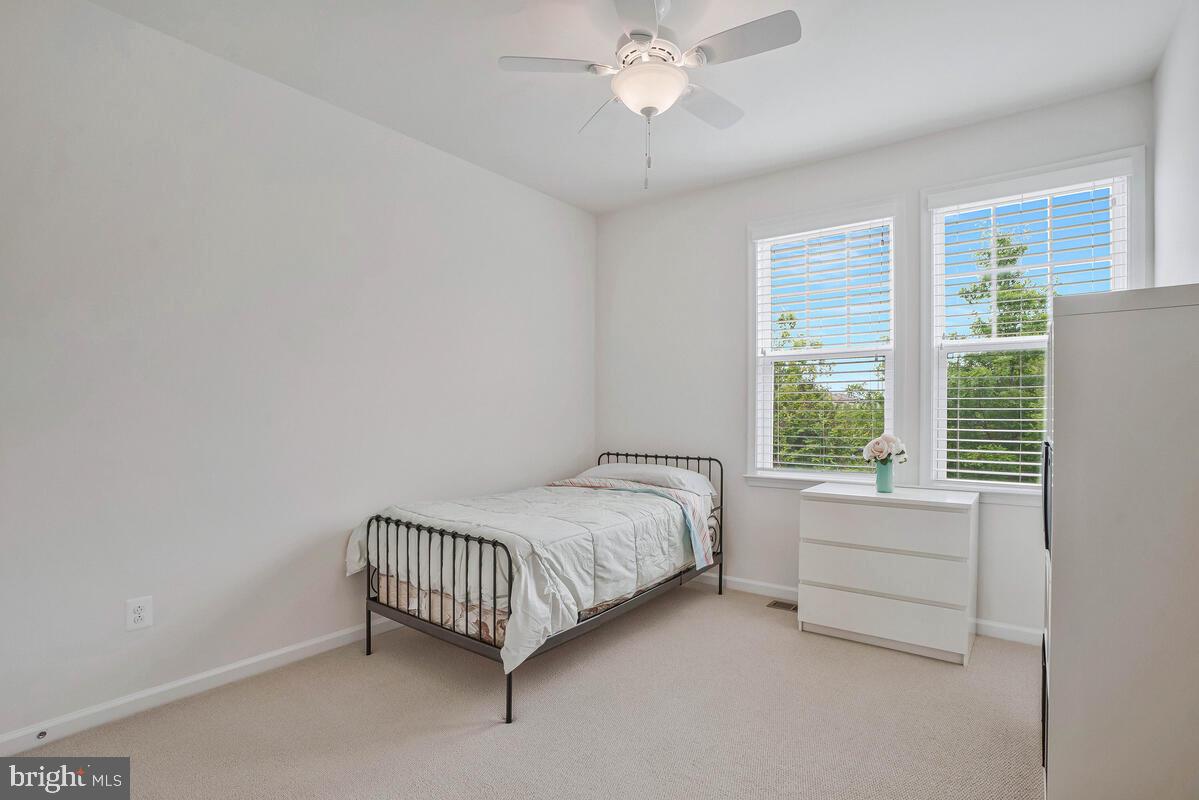 42523 Benfold Square Brambleton, VA 20148 - Photo 5 of 29 a room with a bed and a window