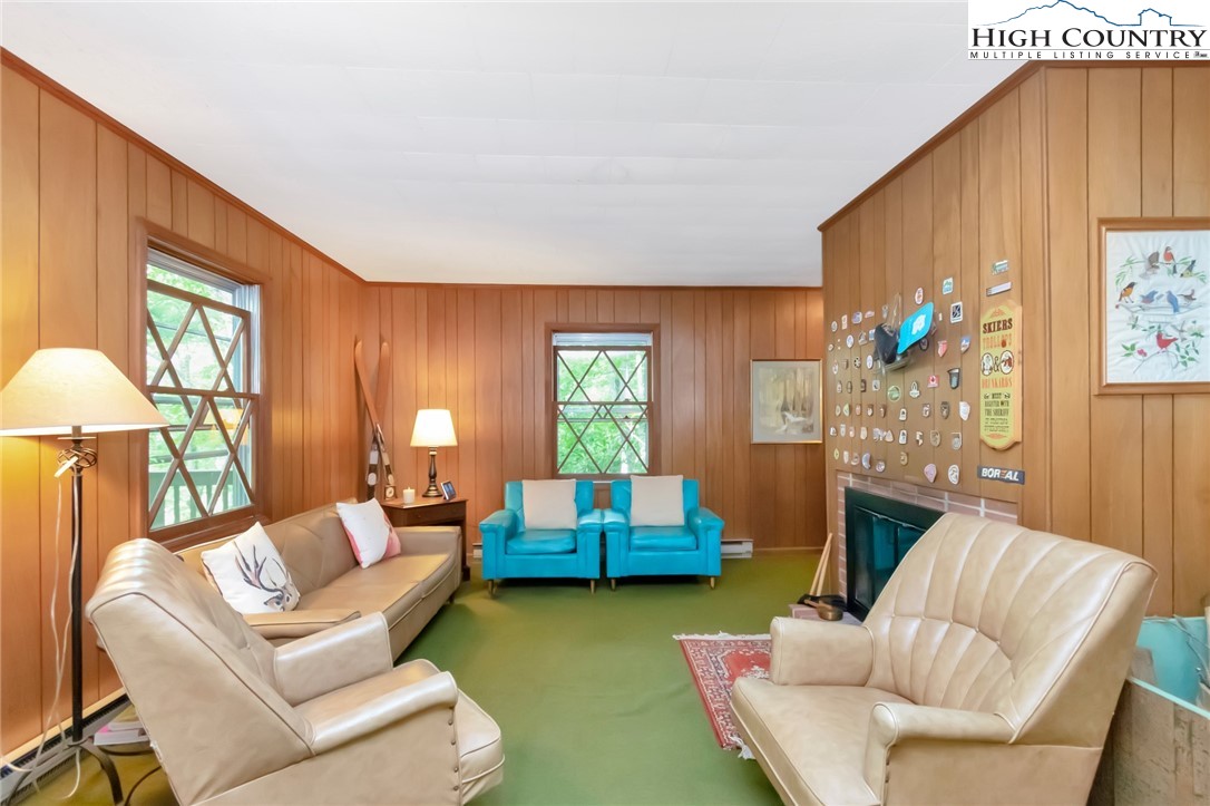 206 Oak Road Beech Mountain, NC 28604 - Photo 6 of 35 a living room with furniture and a window