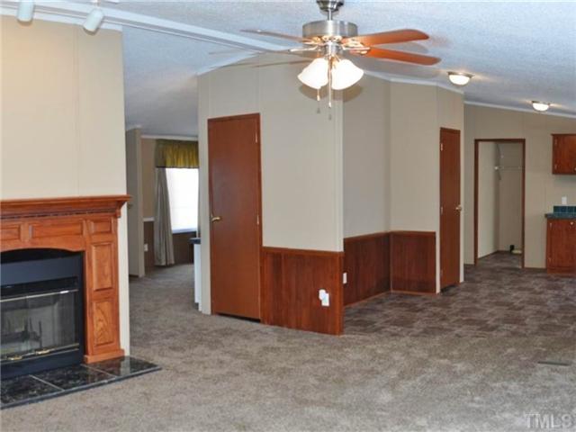 135 Cp And L Access Road Semora, NC 27343 - Photo 8 of 18 Family Room Open to Kitchen