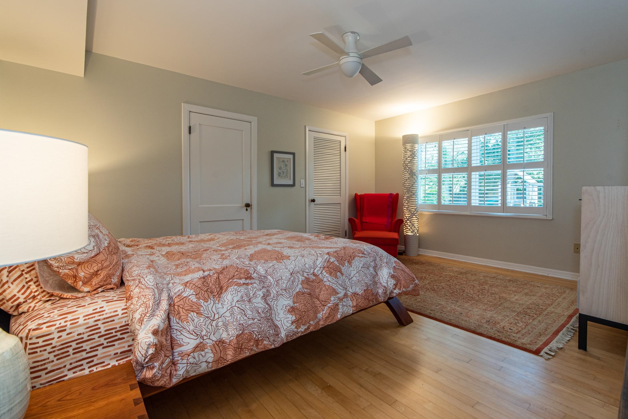 252 South Matanzas Boulevard St. Augustine, FL 32080 - Photo 12 of 32 a bedroom with a bed and wooden floor
