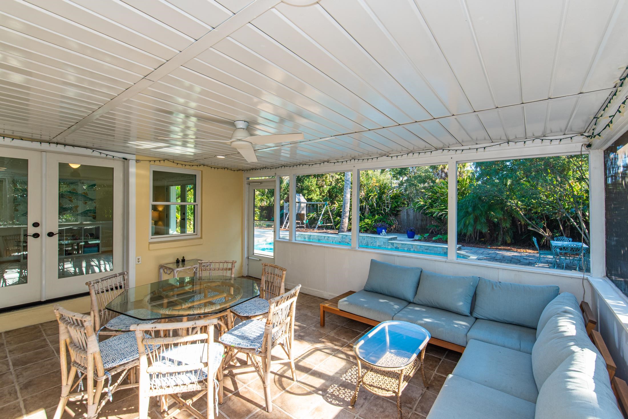 252 South Matanzas Boulevard St. Augustine, FL 32080 - Photo 16 of 32 a view of a patio with couches plants and large tree