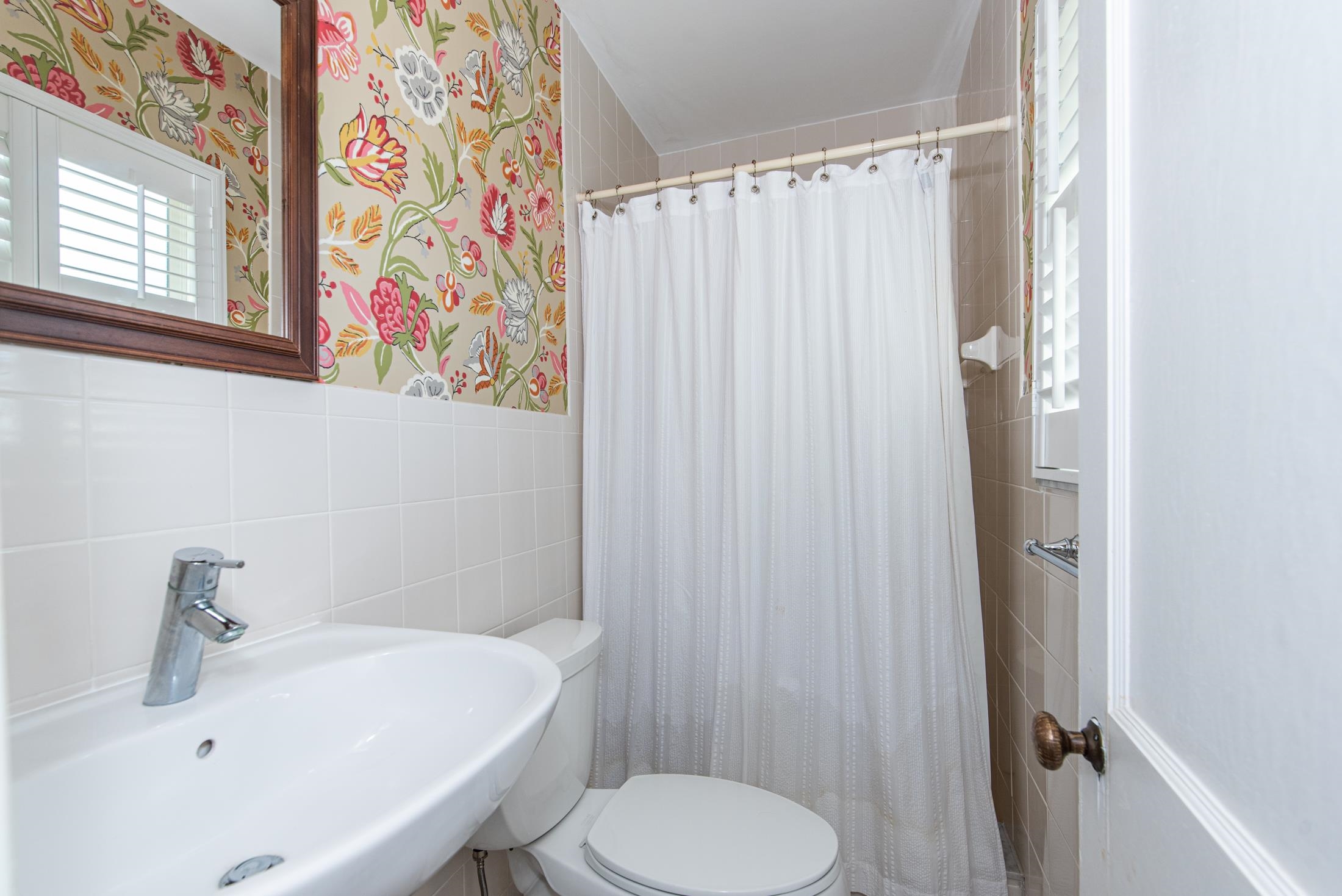 252 South Matanzas Boulevard St. Augustine, FL 32080 - Photo 27 of 32 a bathroom with a sink and a toilet