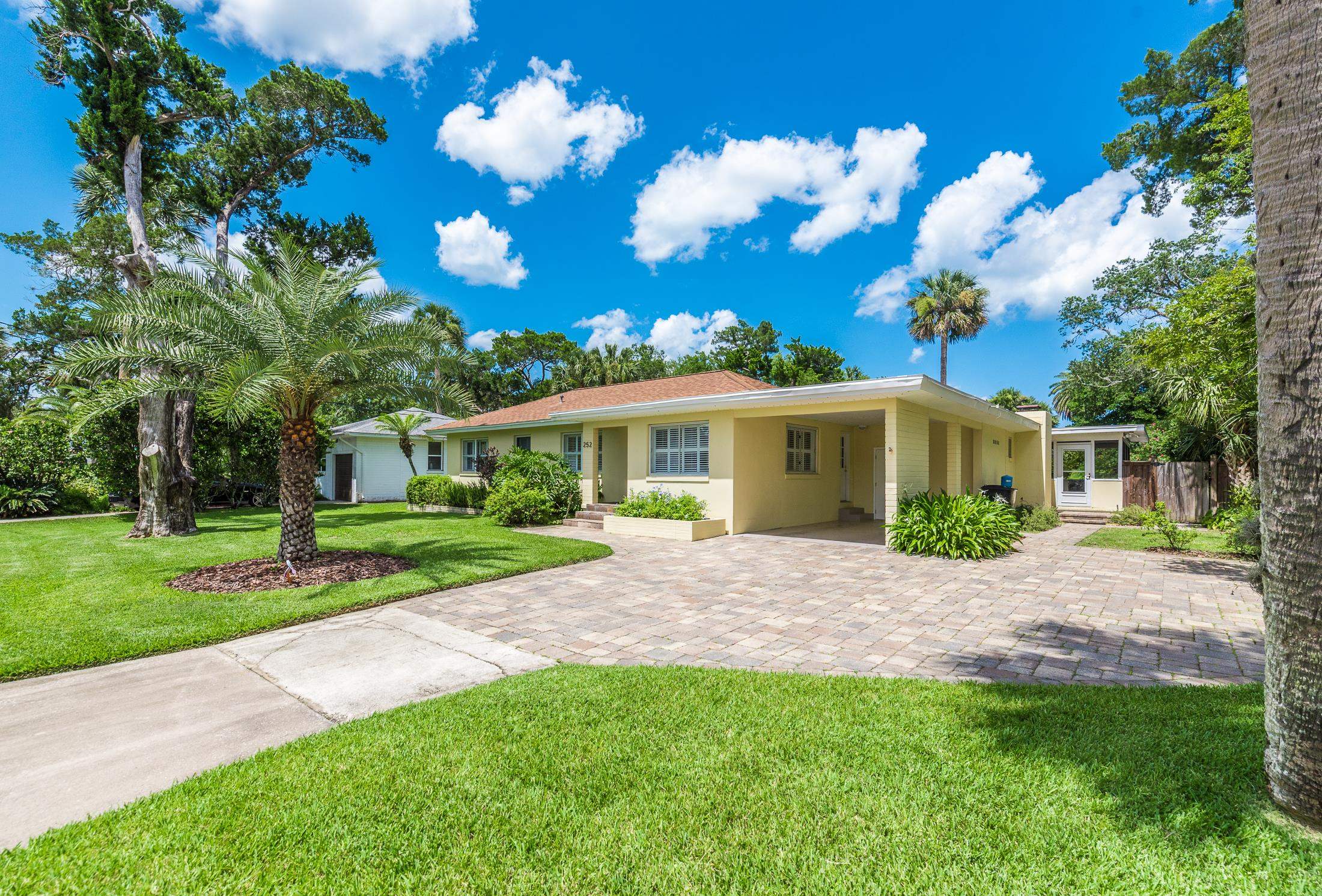 252 South Matanzas Boulevard St. Augustine, FL 32080 - Photo 29 of 32 a view of a house with a garden