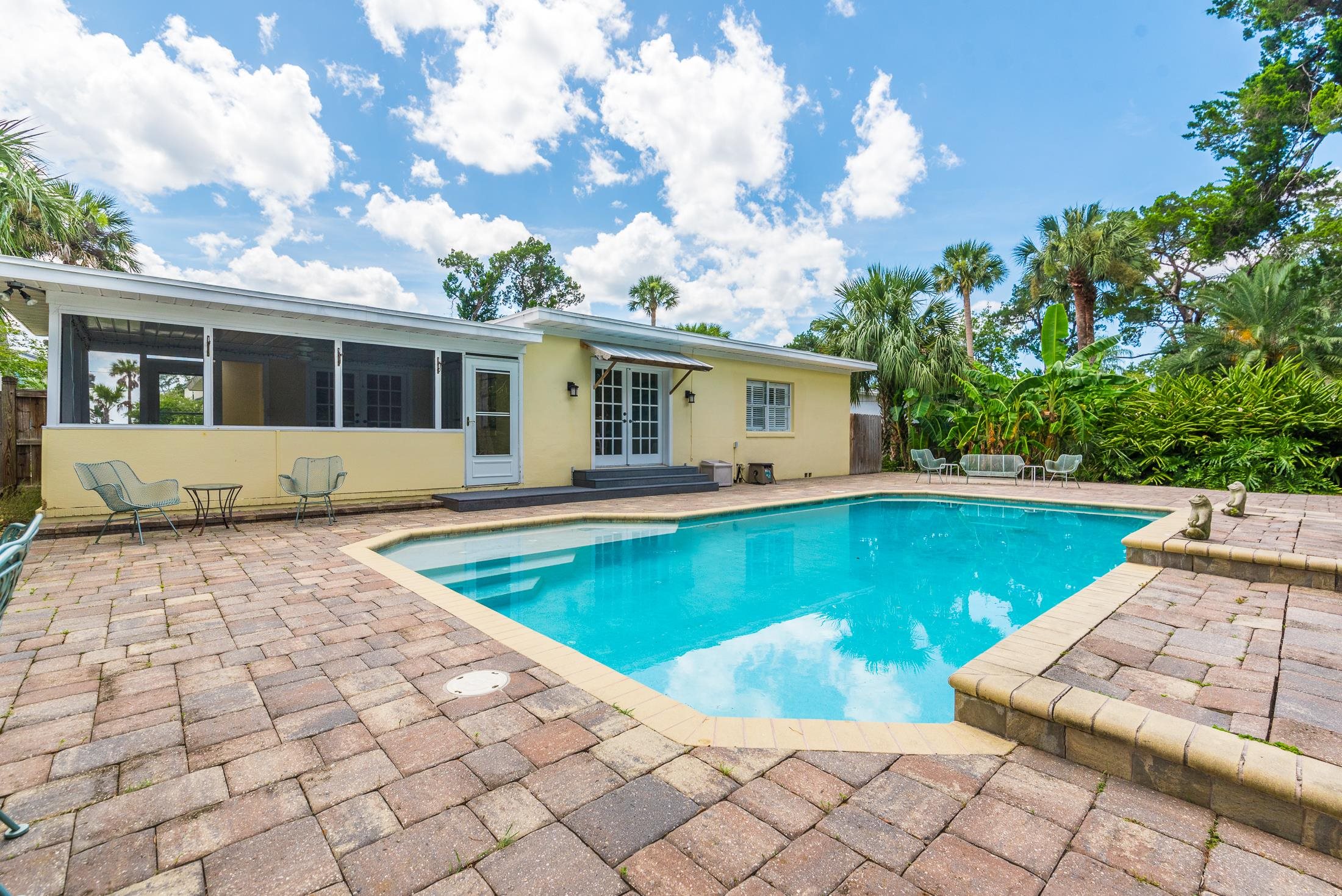 252 South Matanzas Boulevard St. Augustine, FL 32080 - Photo 30 of 32 a view of a swimming pool with lounge chair