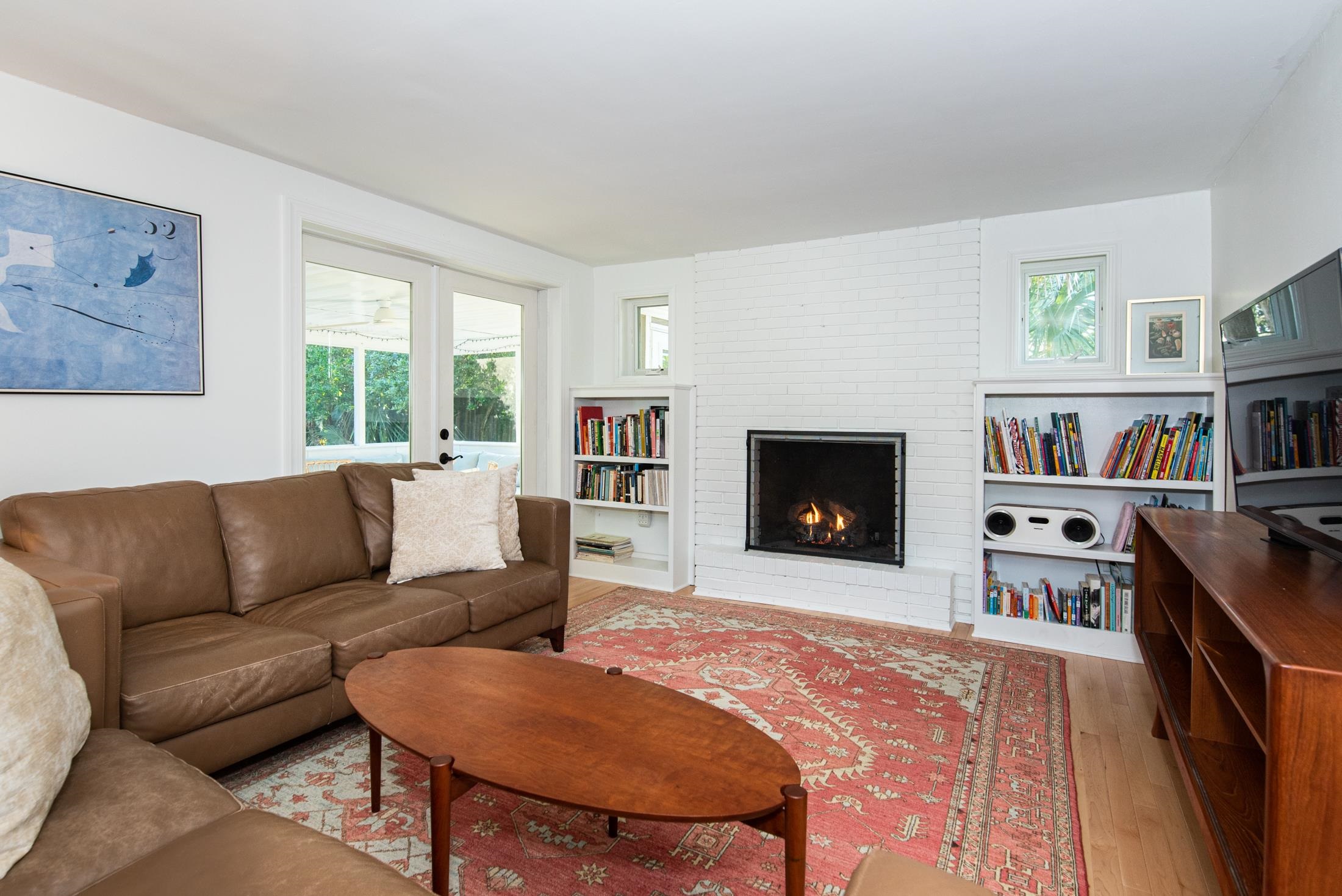 252 South Matanzas Boulevard St. Augustine, FL 32080 - Photo 10 of 32 a living room with furniture and a fireplace