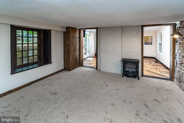 an empty room with windows