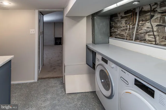 a view of a kitchen from the hallway