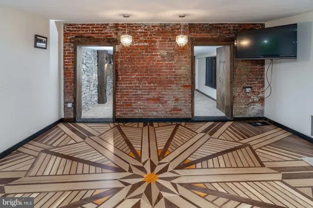 a view of entryway with a front door