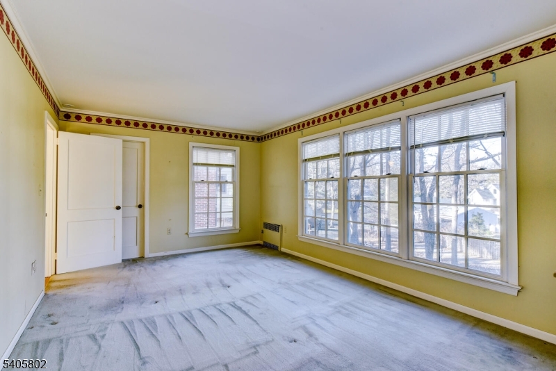 15 Overlook Road Caldwell, NJ 07006 - Photo 21 of 37 a view of an empty room with a window