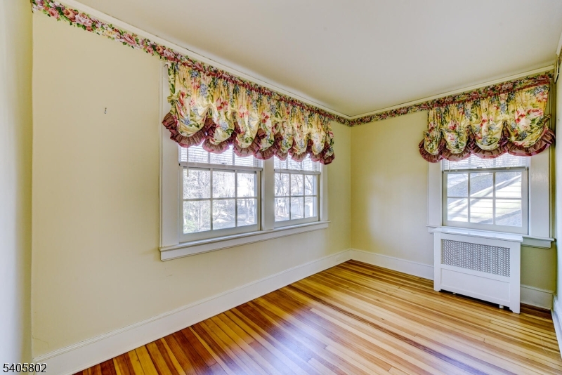 15 Overlook Road Caldwell, NJ 07006 - Photo 29 of 37 a view of a room with wooden floor and a window