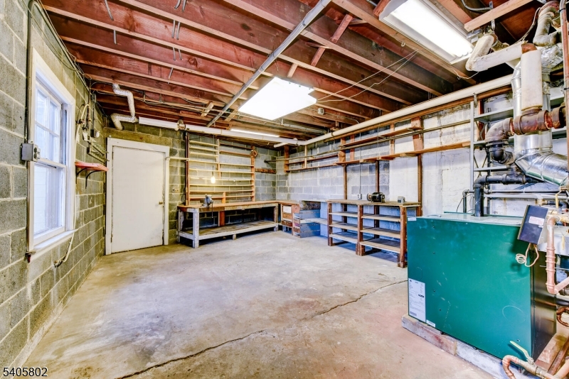 15 Overlook Road Caldwell, NJ 07006 - Photo 32 of 37 a view of a room with furniture garage and windows