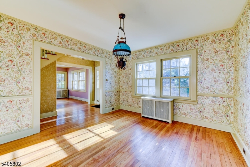 15 Overlook Road Caldwell, NJ 07006 - Photo 4 of 37 wooden floor in an empty room with a window