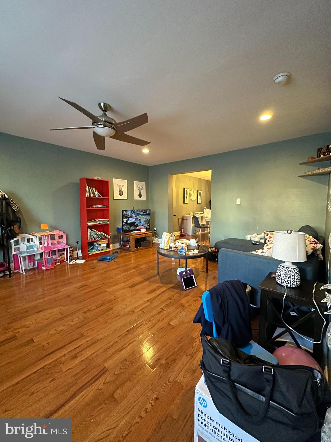 610 Andover Road Upper Darby, PA 19082 - Photo 4 of 22 a living room with lots of furniture and a flat screen tv