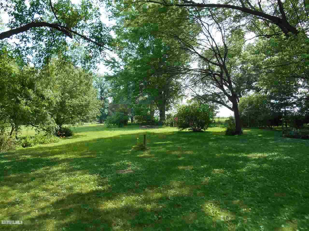 2321 Lancaster Heights Road Freeport, IL 61032 - Photo 16 of 17 a view of green field with trees in the background